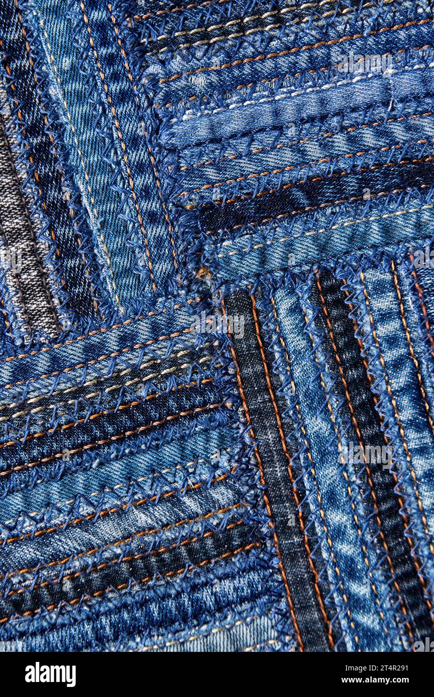 Diagonal denim fabric pattern in patchwork style, made of seams of old ...