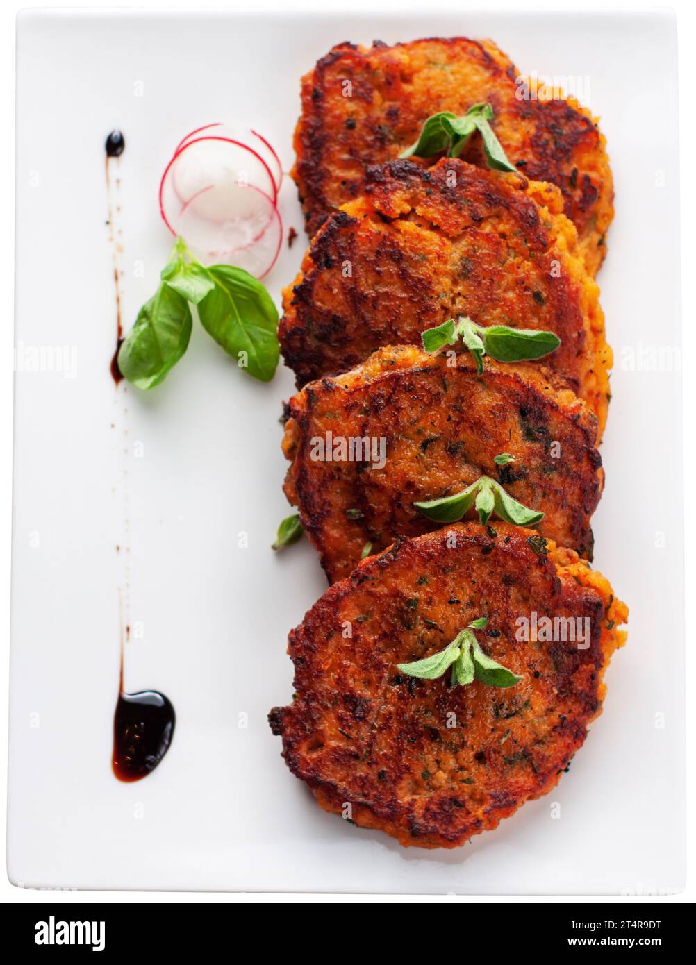 Homemade fried fish patties from canned salmon, sweet potato, eggs and
