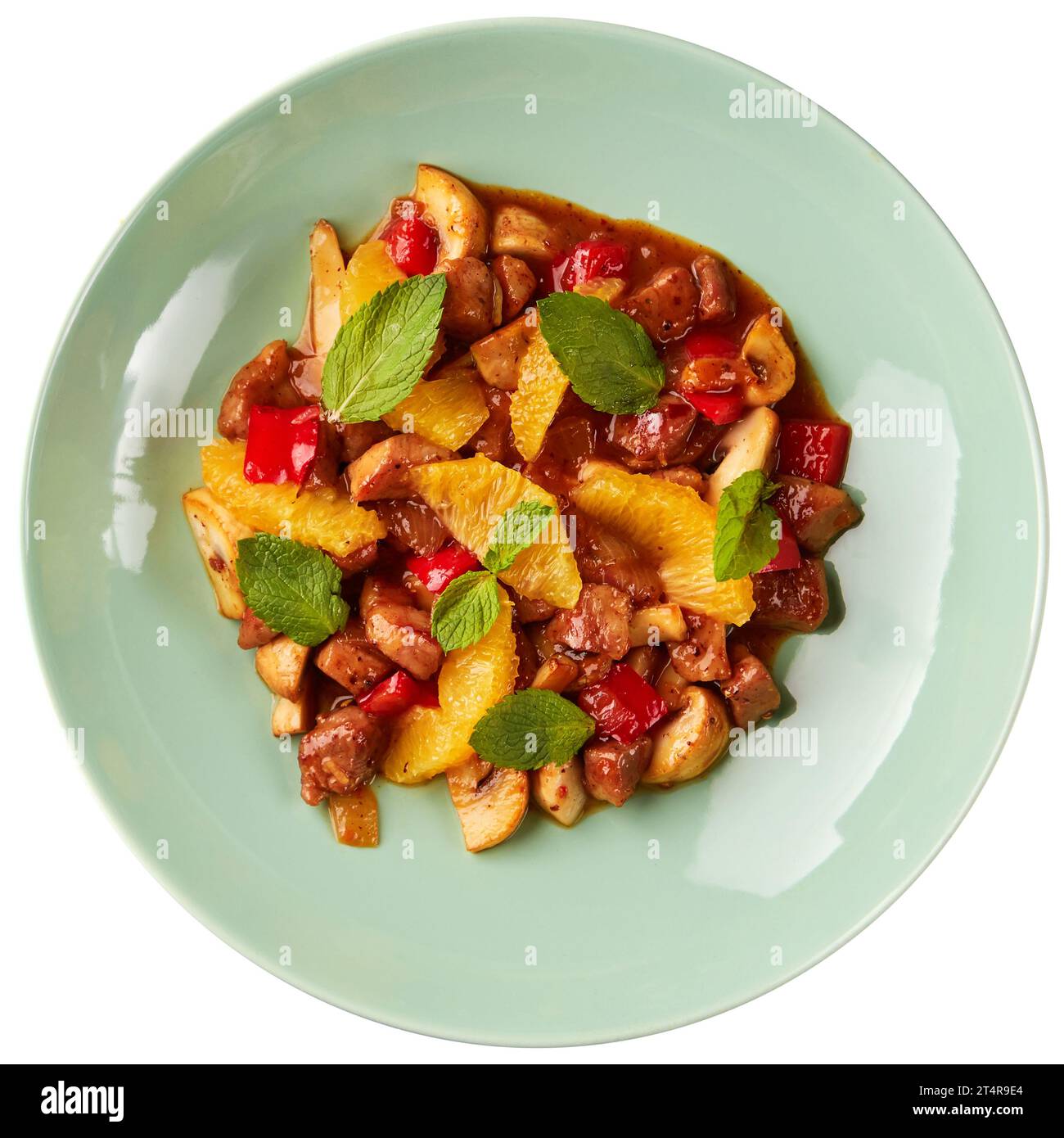 Veal stew with bell pepper, mushrooms, onion, oranges, decorated with ...