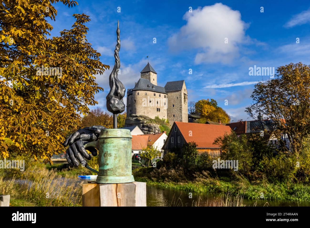 Monument "Der Genuss" with beer mug, hands and a flame, from the sculpture cycle by artist Harald Bäumler in the five communal brewery towns of the Upper Palatinate. Wiesau (VGem), Germany Stock Photo