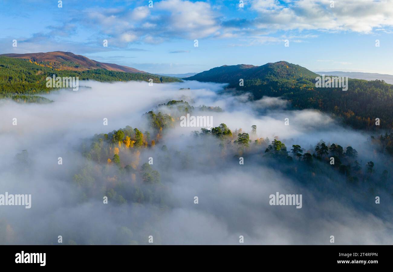 Aerial view of early morning cloud inversion beside Loch Beinn a Mheadhoin in Glen Affric, Scottish Highlands, Scotland,UK Stock Photo