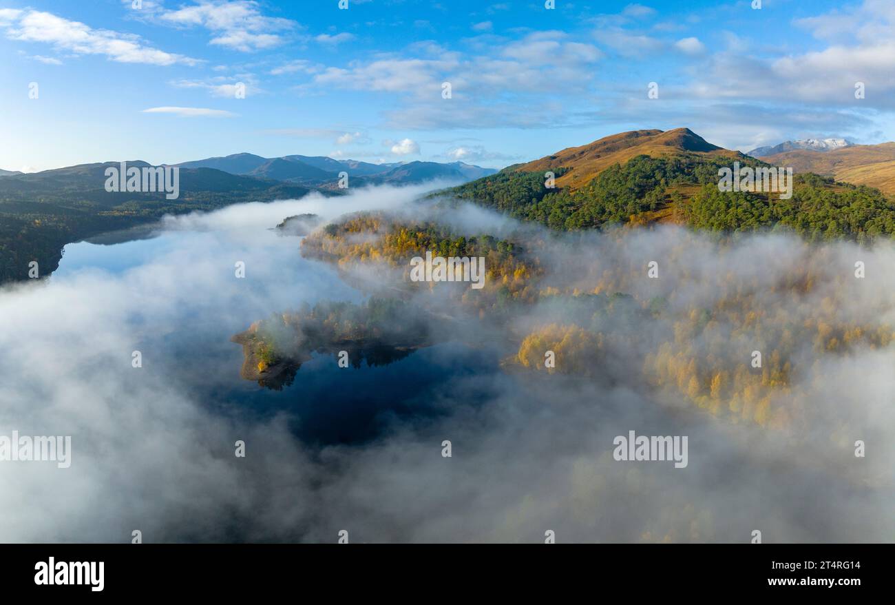 Aerial view of early morning cloud inversion beside Loch Beinn a Mheadhoin in Glen Affric, Scottish Highlands, Scotland,UK Stock Photo