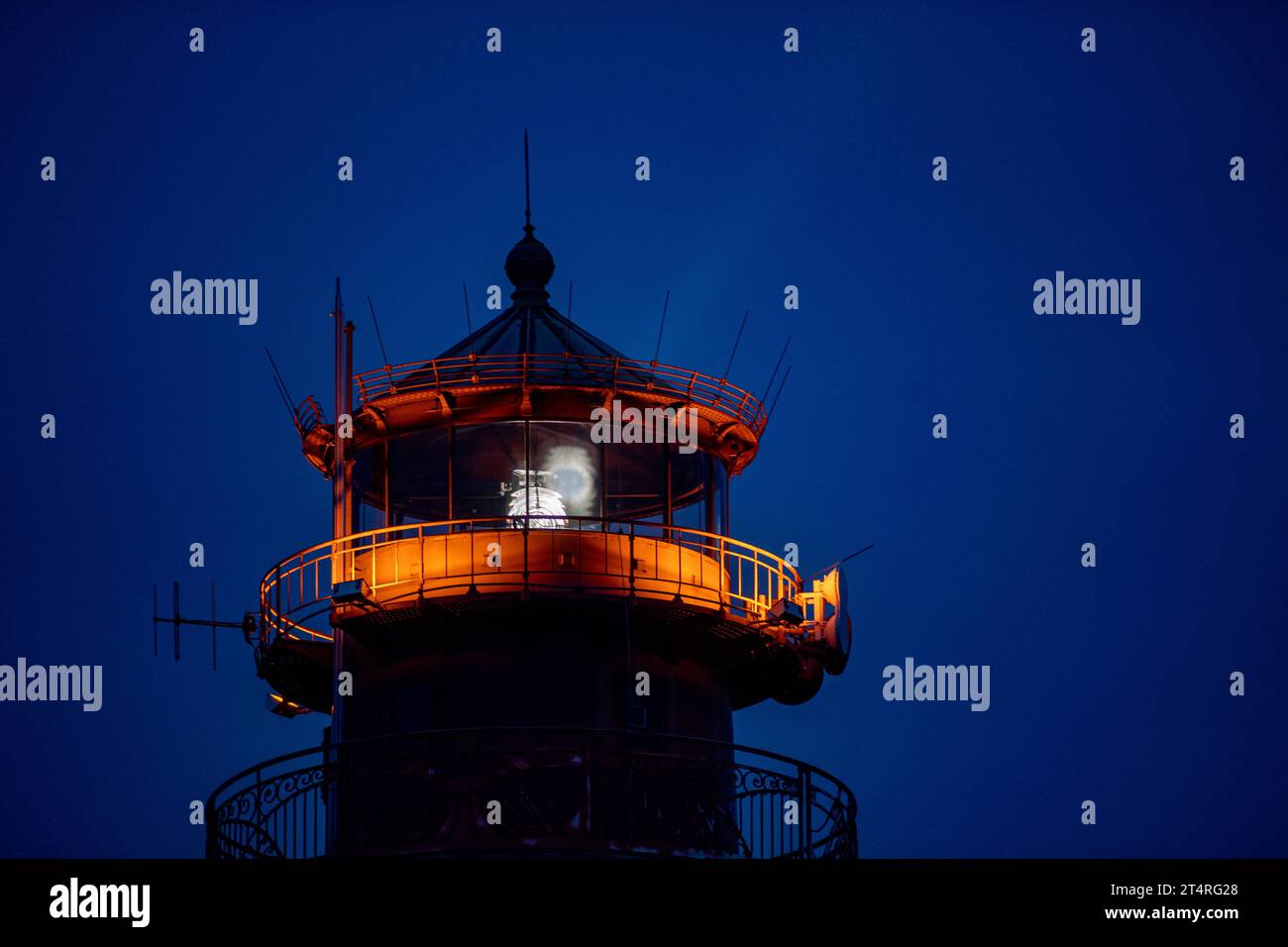 01 November 2023, Mecklenburg-Western Pomerania, Putgarten auf Rügen: The Cape Arkona lighthouse on the island of Rügen sends its light out into the Baltic Sea. After the recent storm surge, the cliff at the northern tip of Rügen, at Cape Arkona, has broken off on a broad front. Photo: -/dpa Stock Photo