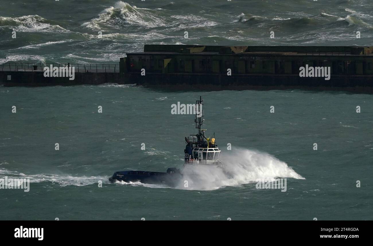 A DFDS ferry leaves the Port of Dover in Kent as bad weather sweeps in