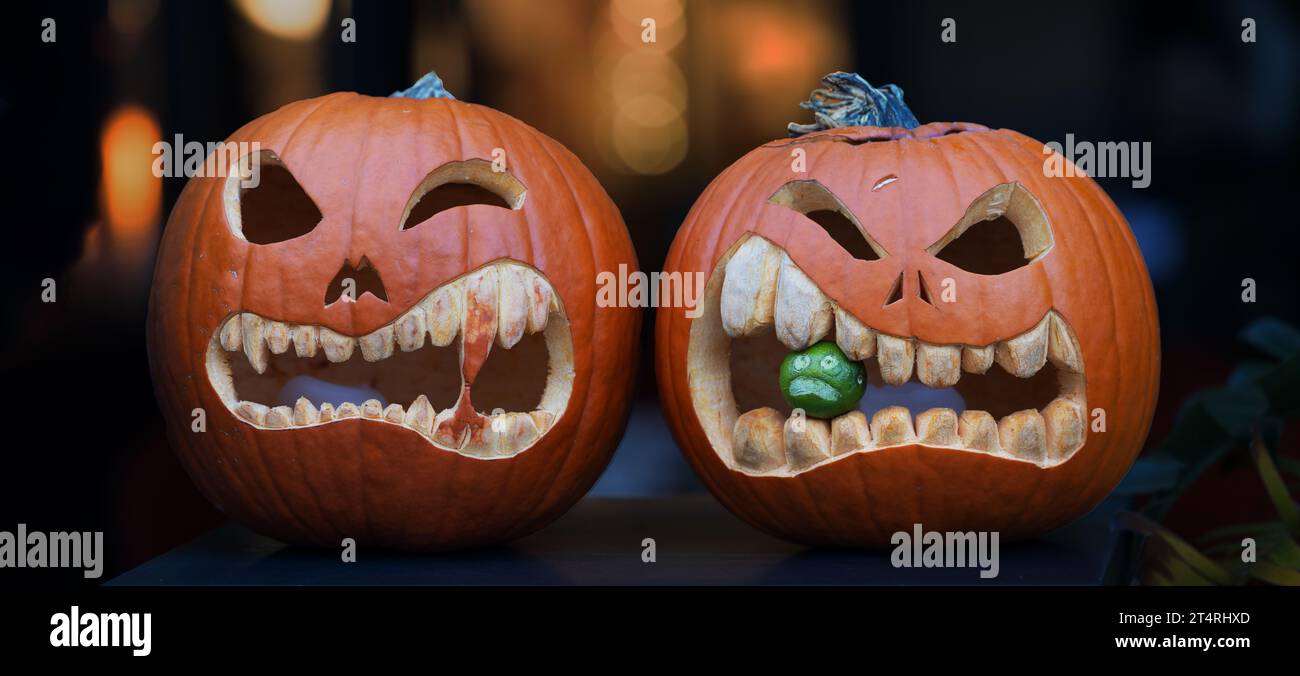 banner or orange halloween pumpkins, jack o' lantern dark background Stock Photo