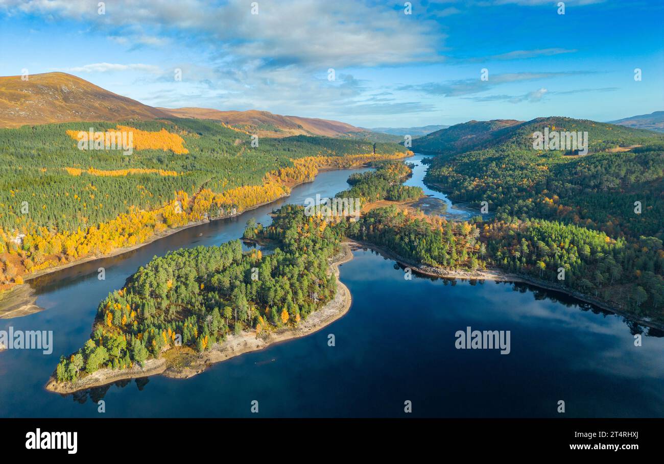Aerial views of autumnal colours in woodland beside Loch Beinn a Mheadhoin in Glen Affric, Scottish Highlands, Scotland,UK Stock Photo