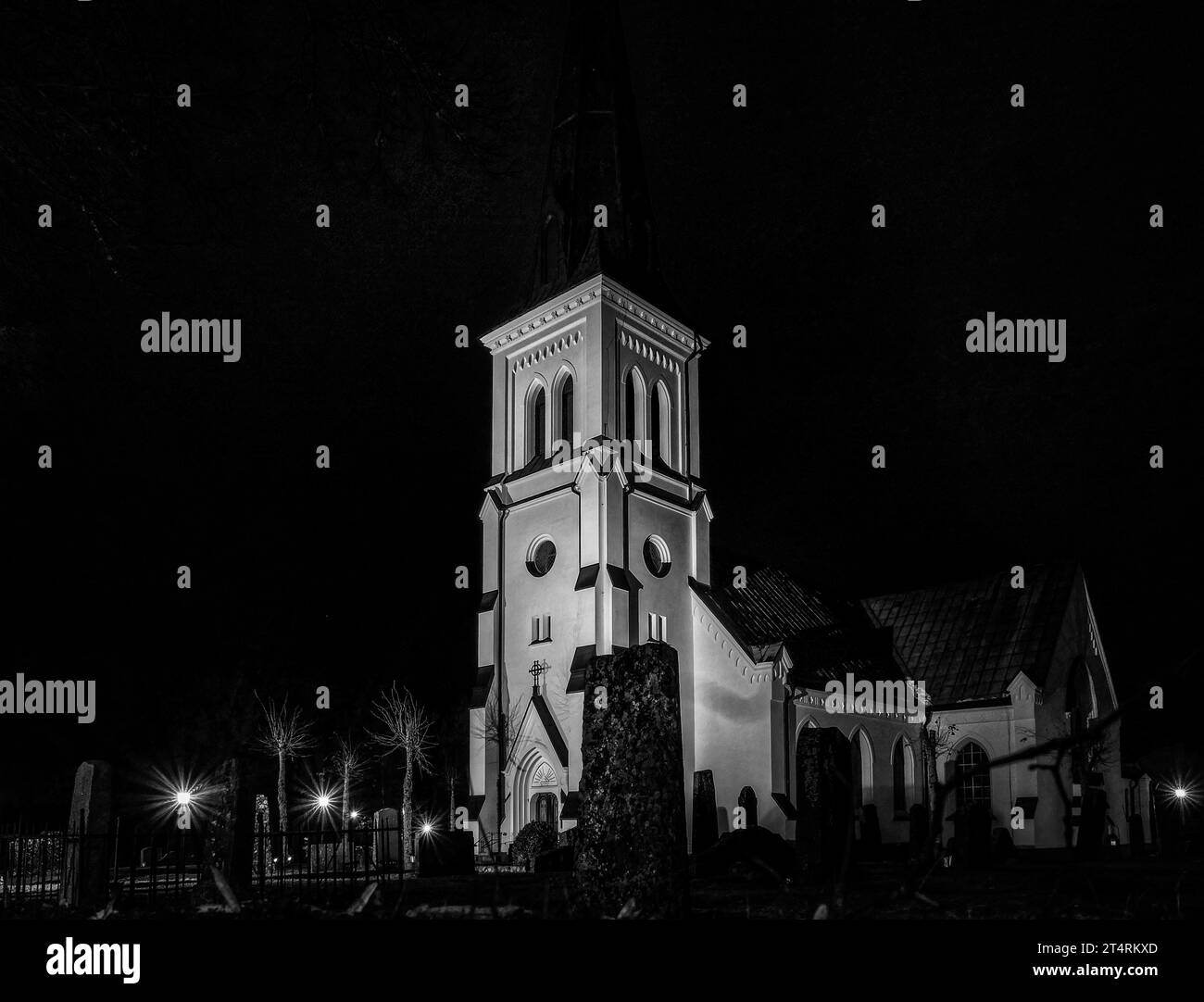 A Church Tower Lit Up At Night Stock Photo Alamy a-church-tower-lit-up-at-night-stock-photo-alamy