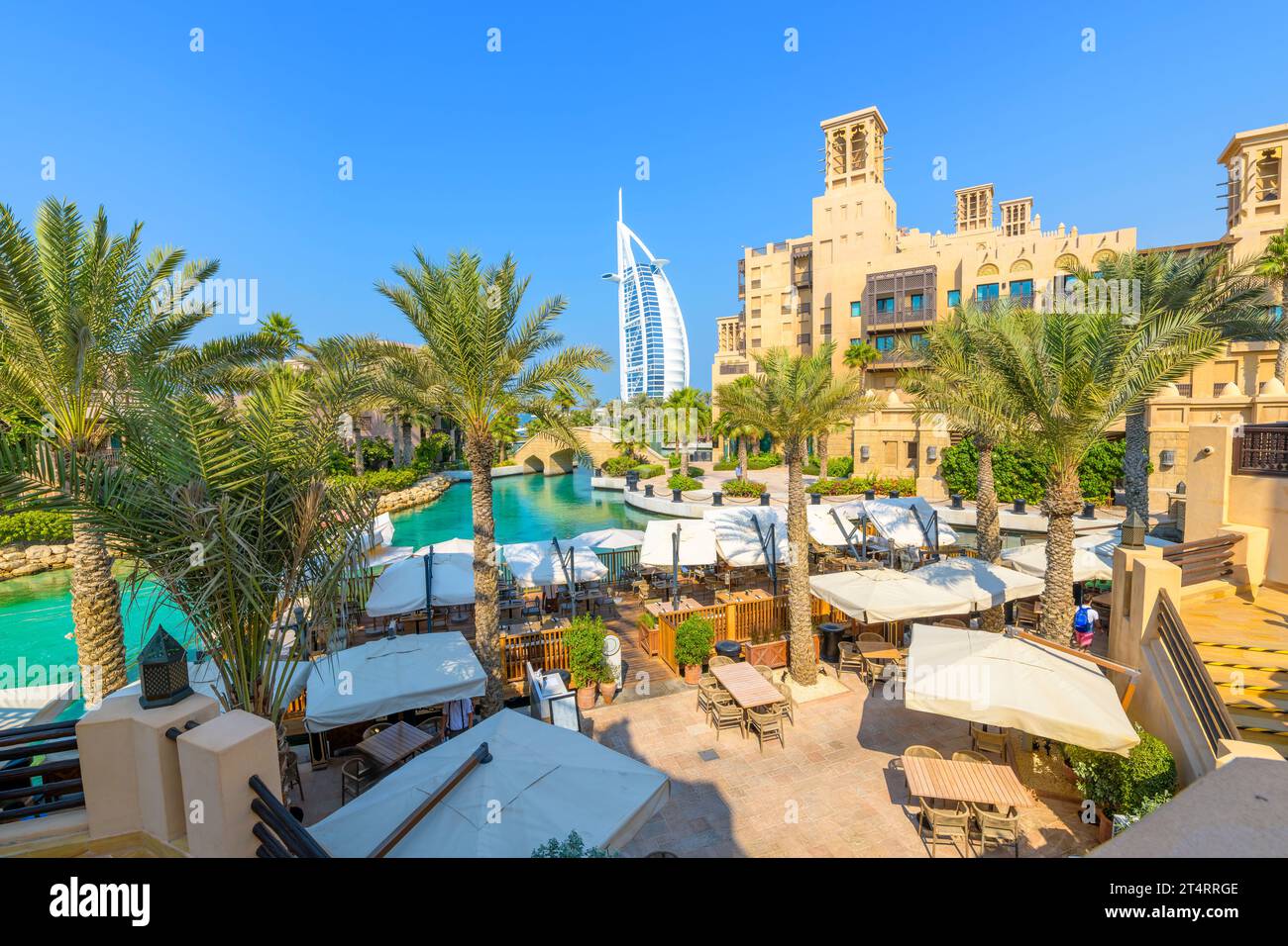 The canal, cafes and shops of the Souk Madinat Jumeirah, an upscale shopping market and mall in Dubai, United Arab Emirates Stock Photo