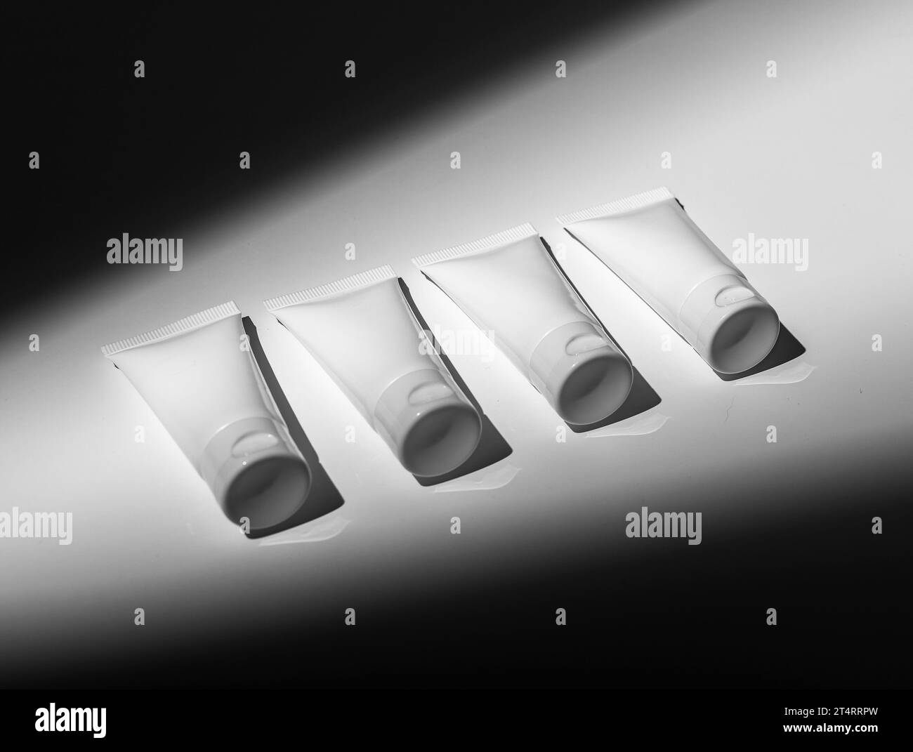 Four plastic containers Black and White Stock Photos & Images Alamy