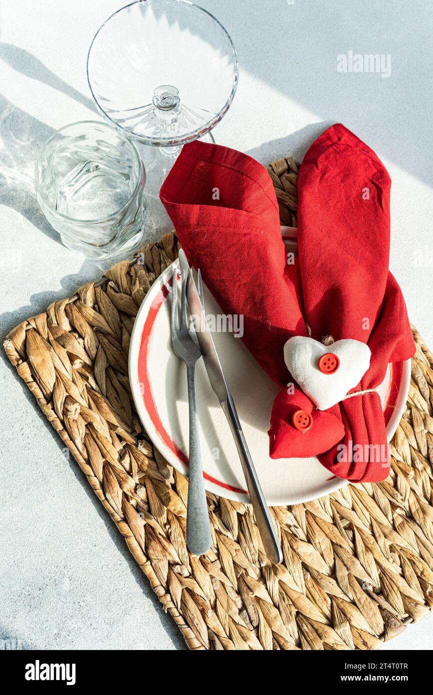 Overhead view of a romantic place setting for Valentine's Day Stock Photo
