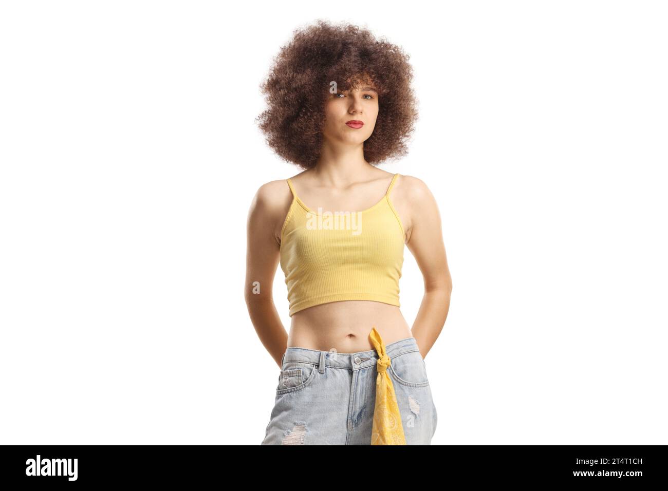 Young caucasian woman with afro hairstyle posing isolated on white background Stock Photo