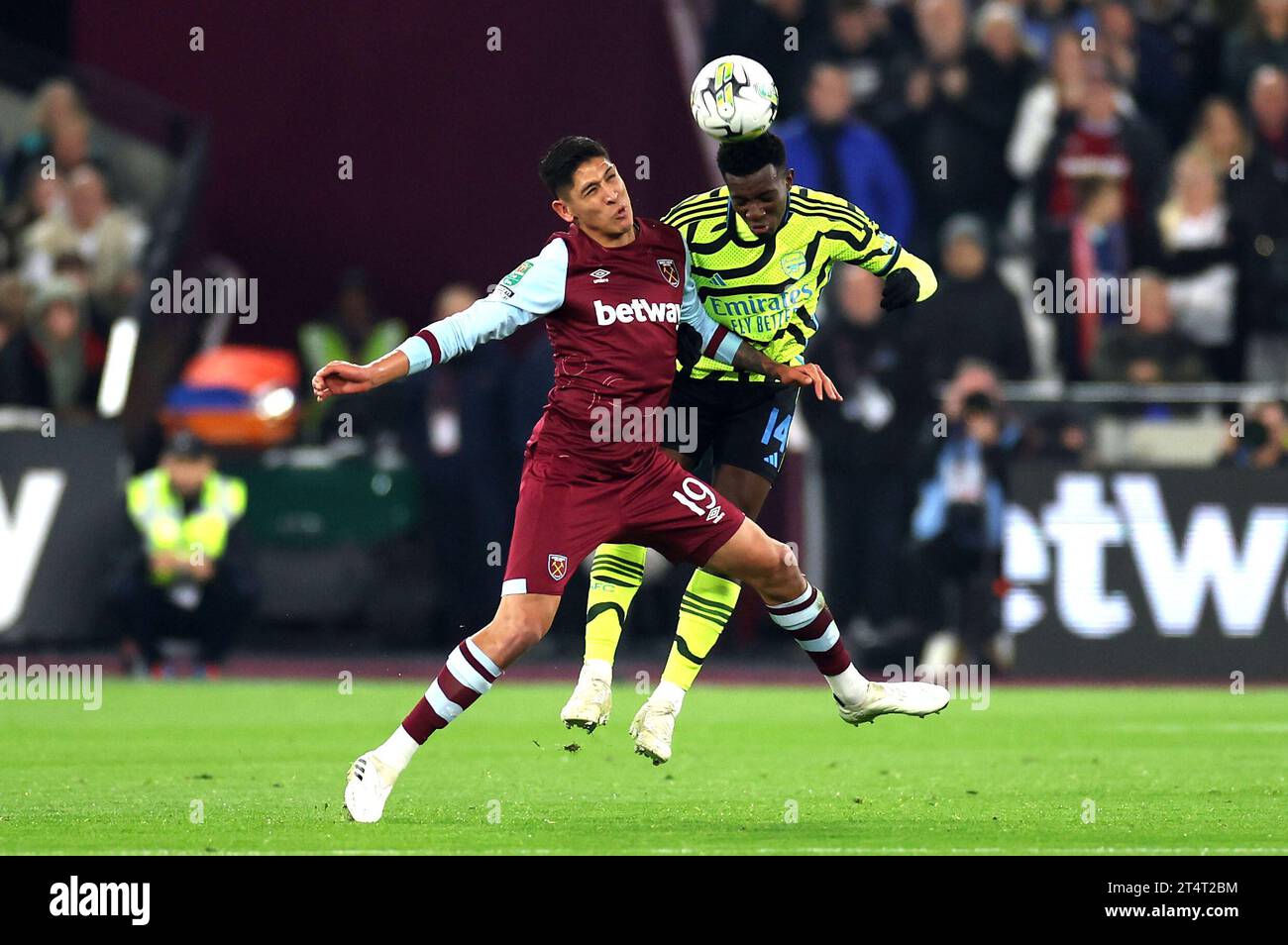 West Ham United's Edson Alvarez (left) and Arsenal's Eddie Nketiah battle for the ball during the Carabao Cup fourth round match at the London Stadium, London. Picture date: Wednesday November 1, 2023. Stock Photo