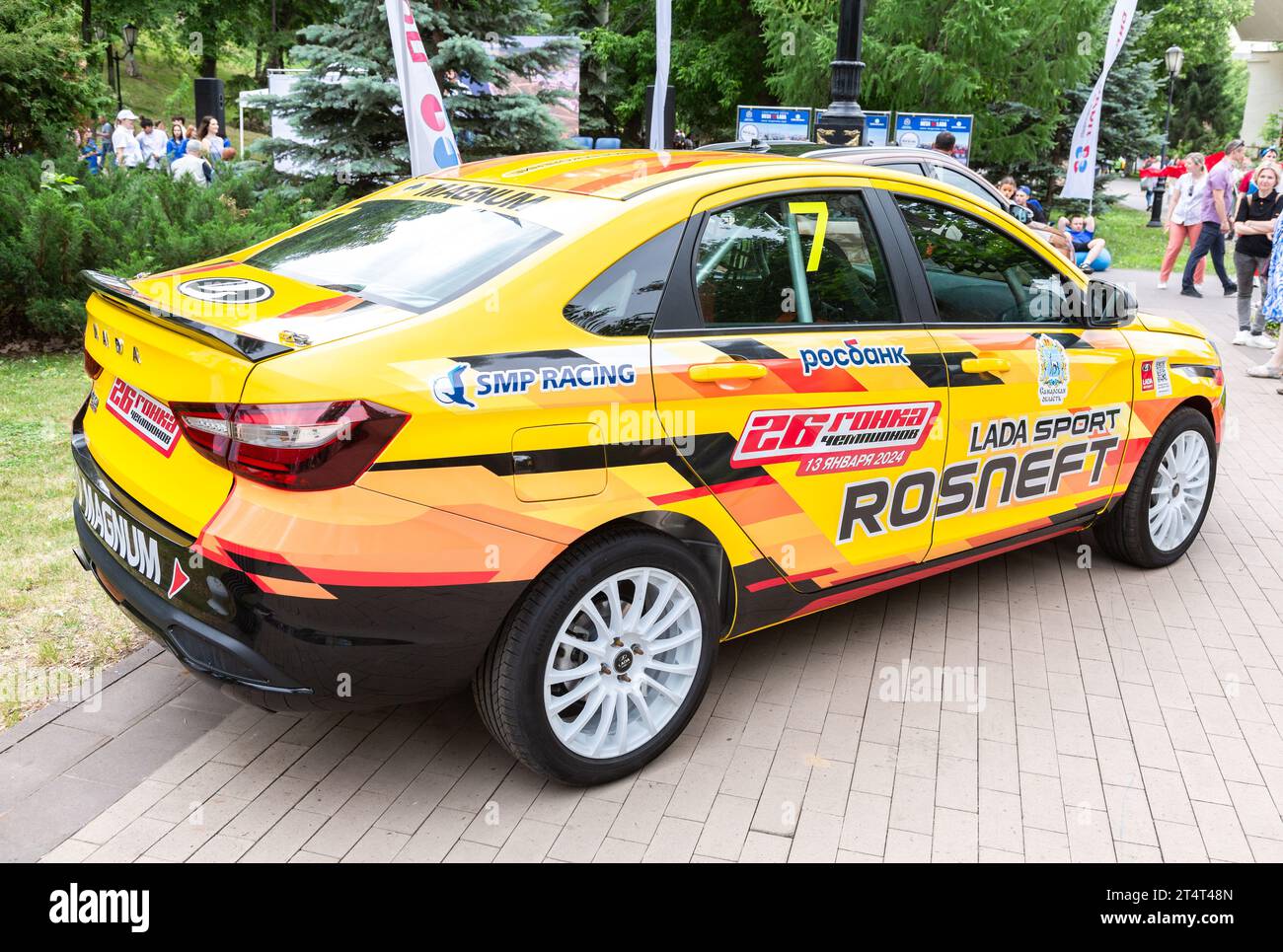Samara, Russia - June 17, 2023: New Russian Lada Vesta Sport vehicle at the city street with Rosneft oil company logo Stock Photo
