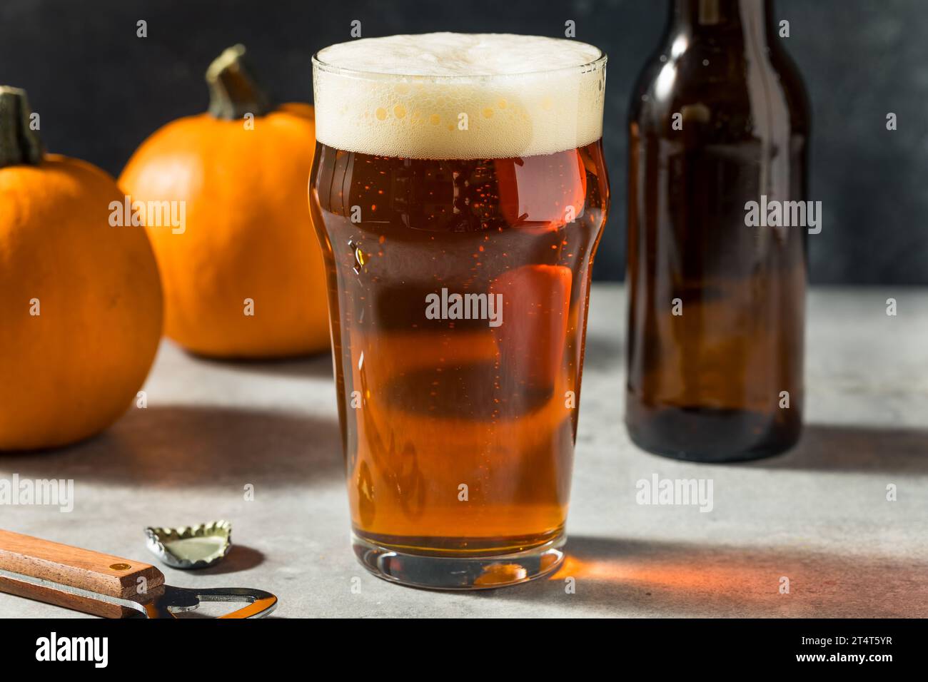 Boozy Refreshing Cold Pumpkin Ale Craft Beer in a Pint Glass Stock Photo