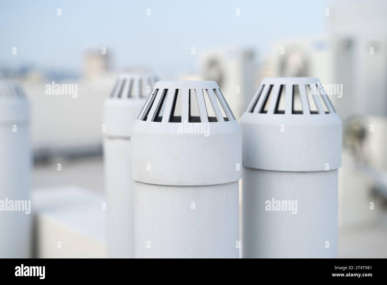 multiple toilet ventilation pipe on top of the apartment Stock Photo
