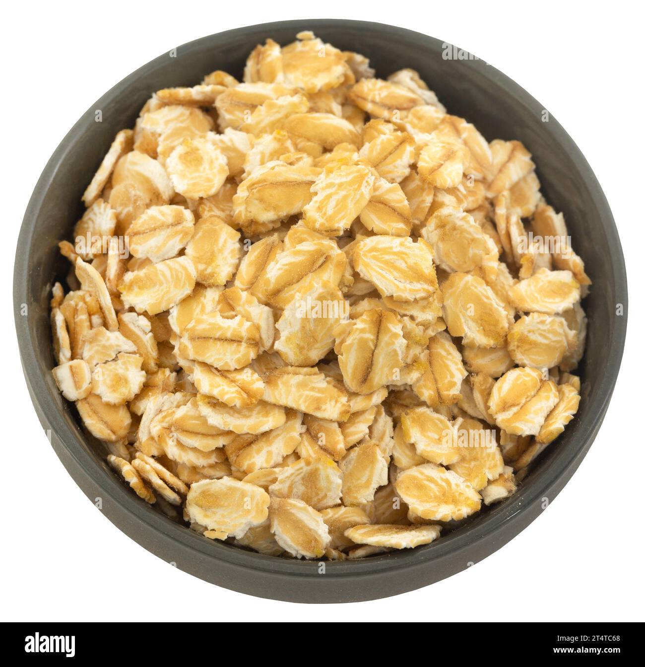 Whole oats in a bowl Stock Photo