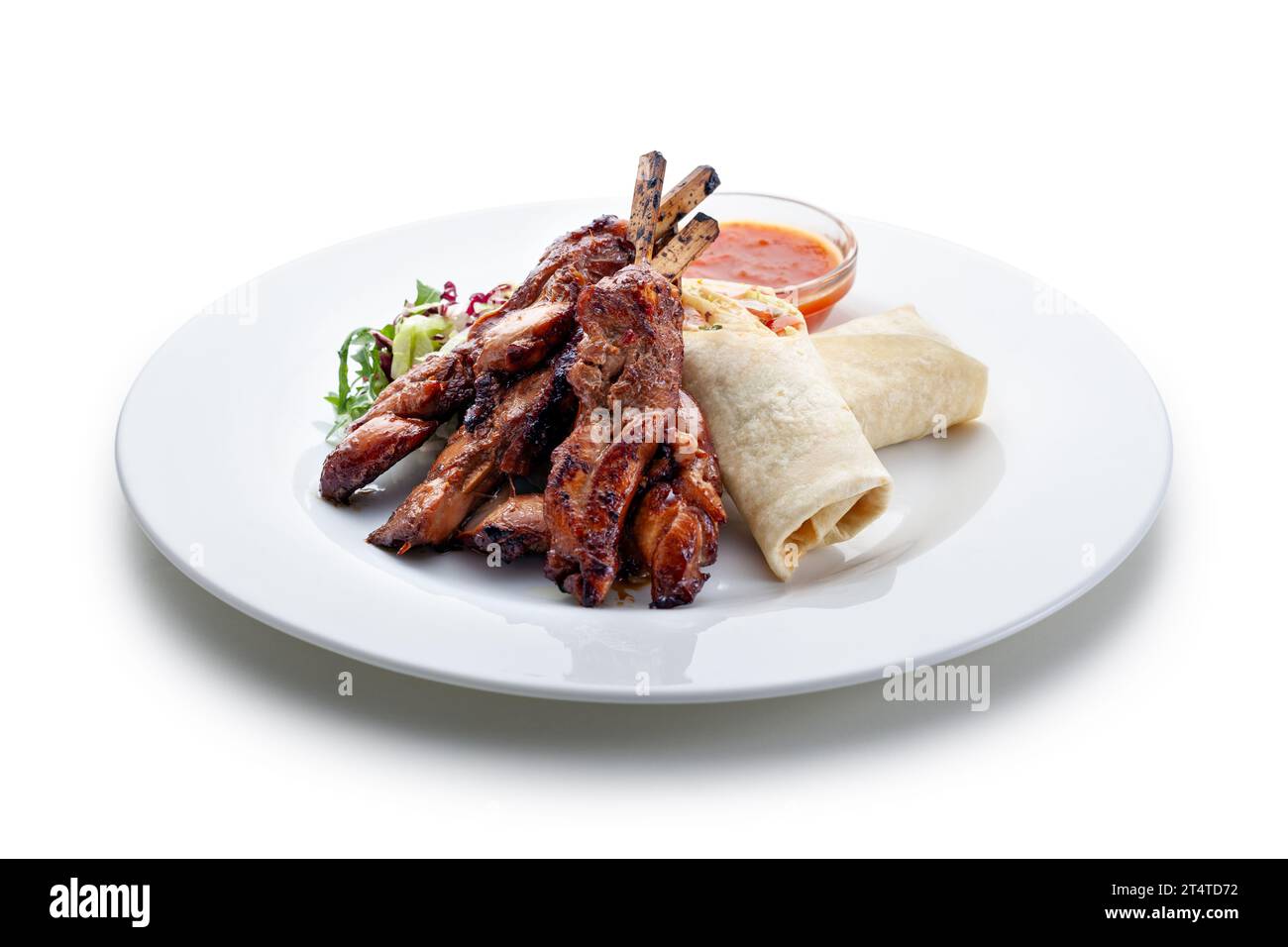 chicken satay with tortillas, dressing Stock Photo