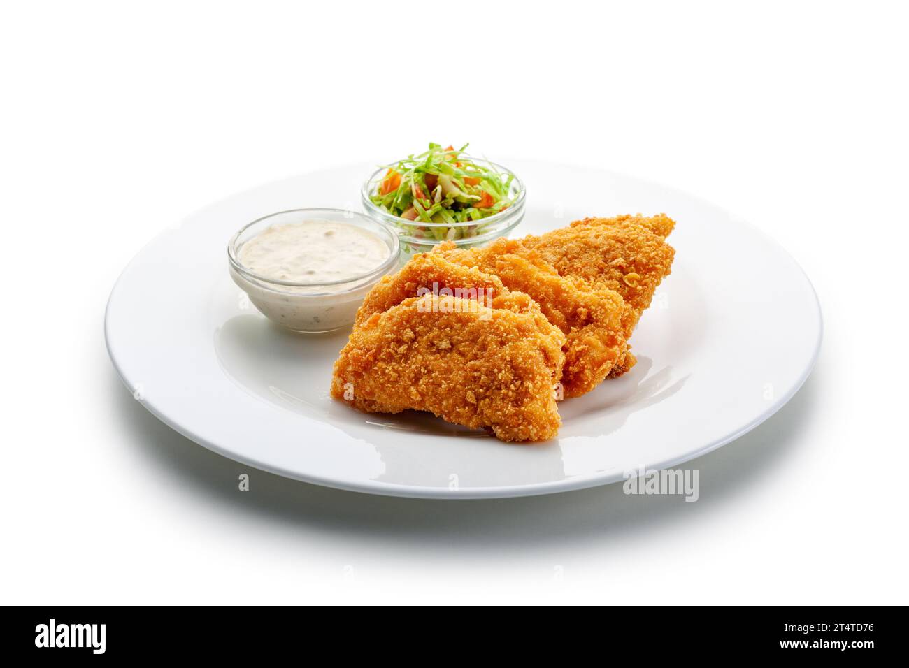 fried chicken cutlets in cornflakes, vegetable, dresssing Stock Photo