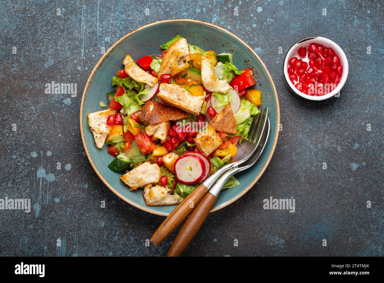 Traditional Levant dish Fattoush salad, Arab cuisine, made with pita bread croutons, vegetables