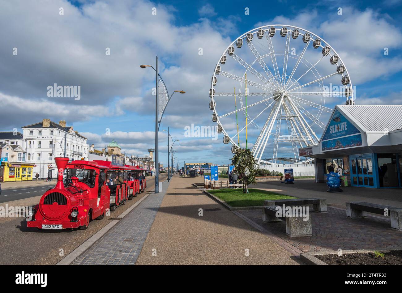 The image is of the typical English seaside holiday resort town of Great Yarmouth looking along the promenade with its various tourist attractions Stock Photo