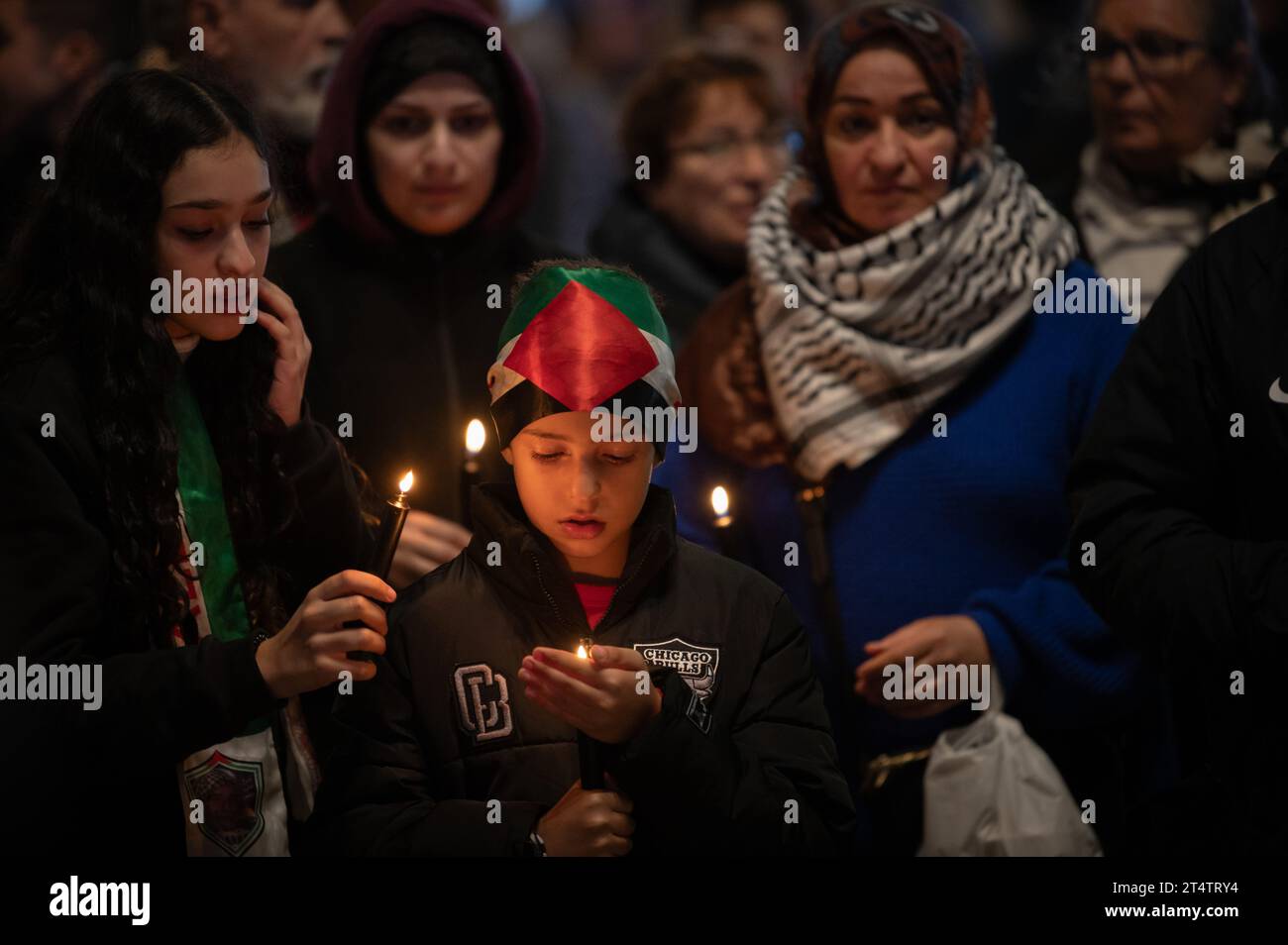 Madrid, Spain. 01st Nov, 2023. People hold candles during a vigil