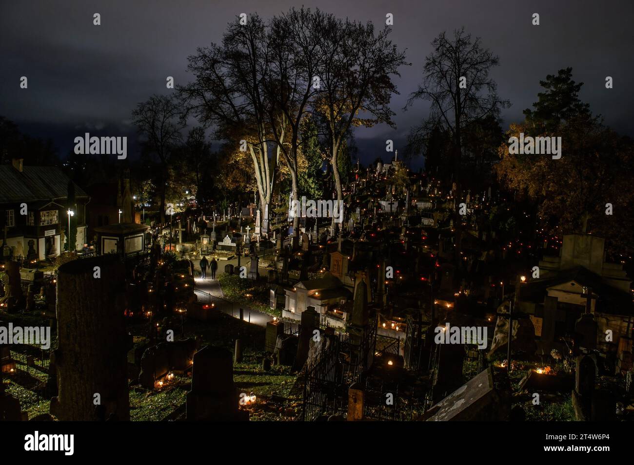 Candles Are Lit On The Tombs To Mark The All Saints Day At The Rasos candles-are-lit-on-the-tombs-to-mark-the-all-saints-day-at-the-rasos