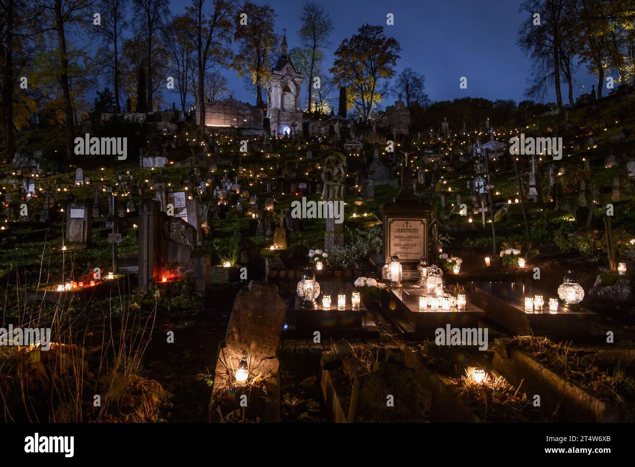 Candles Are Lit On The Tombs To Mark The All Saints Day At The Rasos candles-are-lit-on-the-tombs-to-mark-the-all-saints-day-at-the-rasos