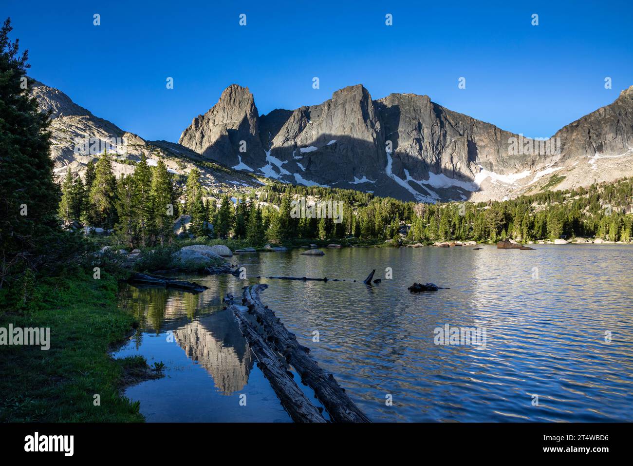 WY05560-00...WYOMING - Warbonnet Peak reflecting in Lonesome Lake, part of the Cirque of the Towers in the Popo Agie Wilderness. Stock Photo