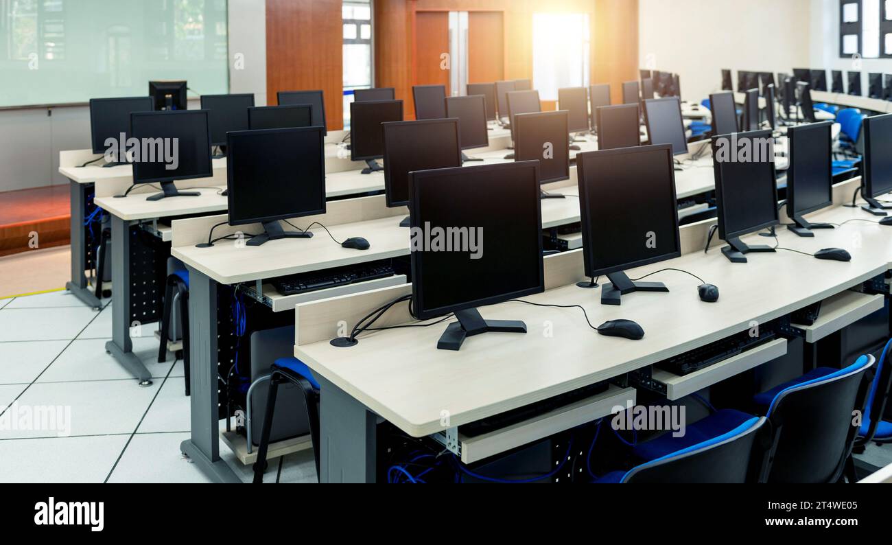 Group of computers in computer lab Stock Photo - Alamy