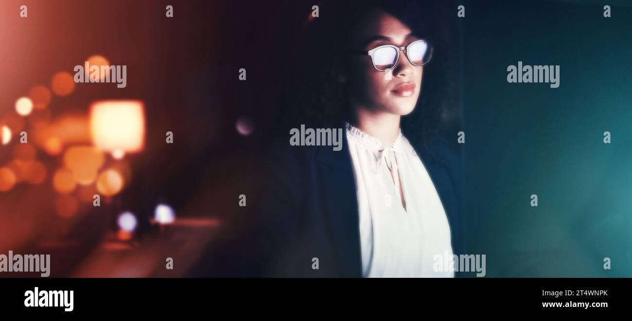 Computer, night and programmer with a black woman developer working late in her office for coding. Software, cybersecurity and programming with a Stock Photo