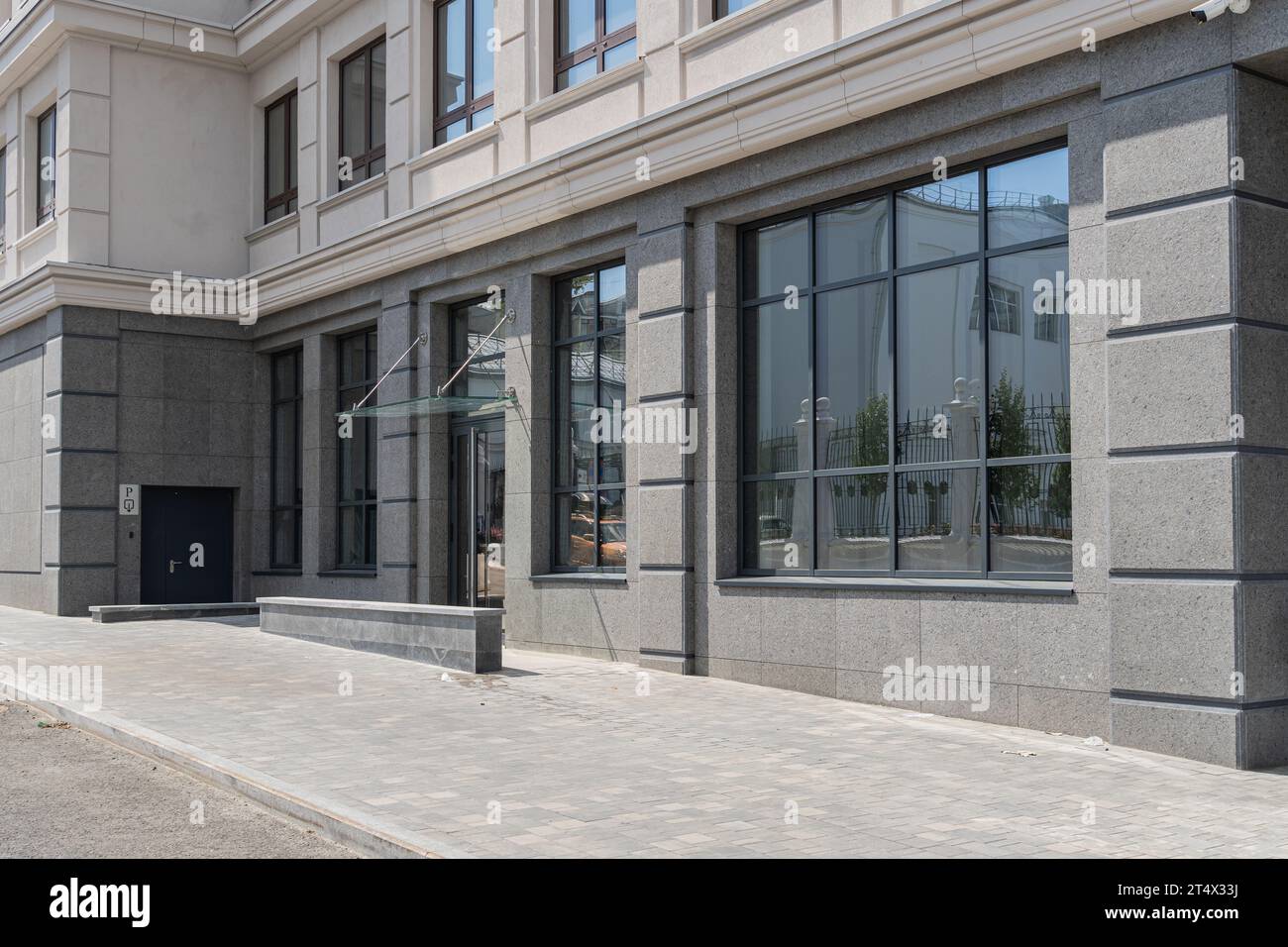 New building facade in housing complex. Modern style in architecture ...
