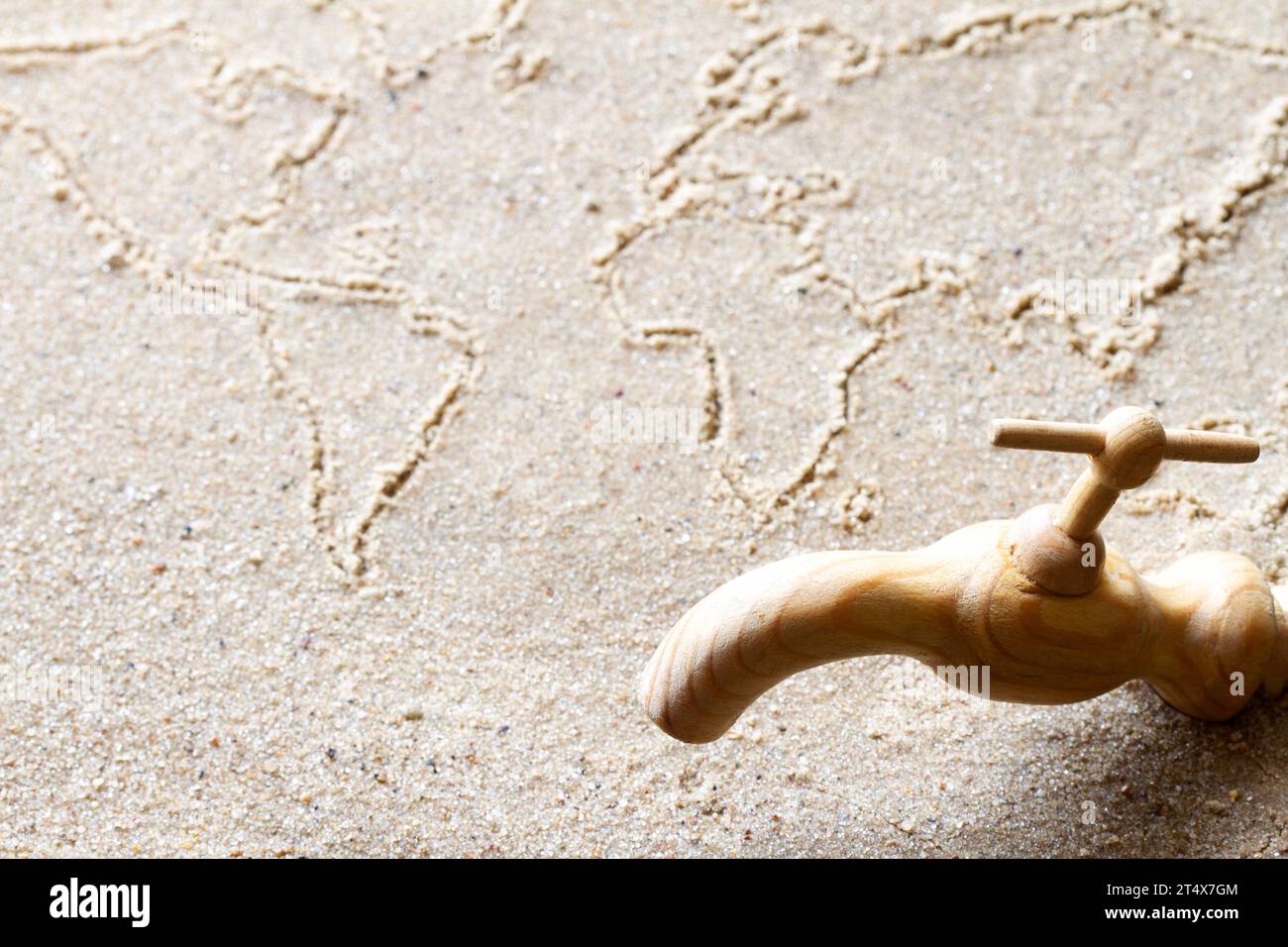 World map on sand, tap, climate change, environment crisis global warming concept Stock Photo