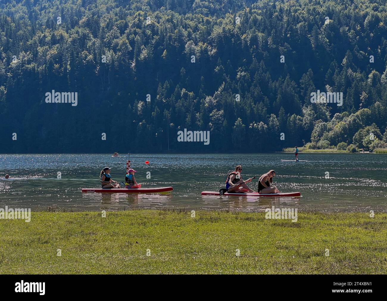 Hiker and cyclists at Weissensee lake recreation area in Füssen, Germany, Sept 5, 2023. Credit: Imago/Alamy Live News Stock Photo