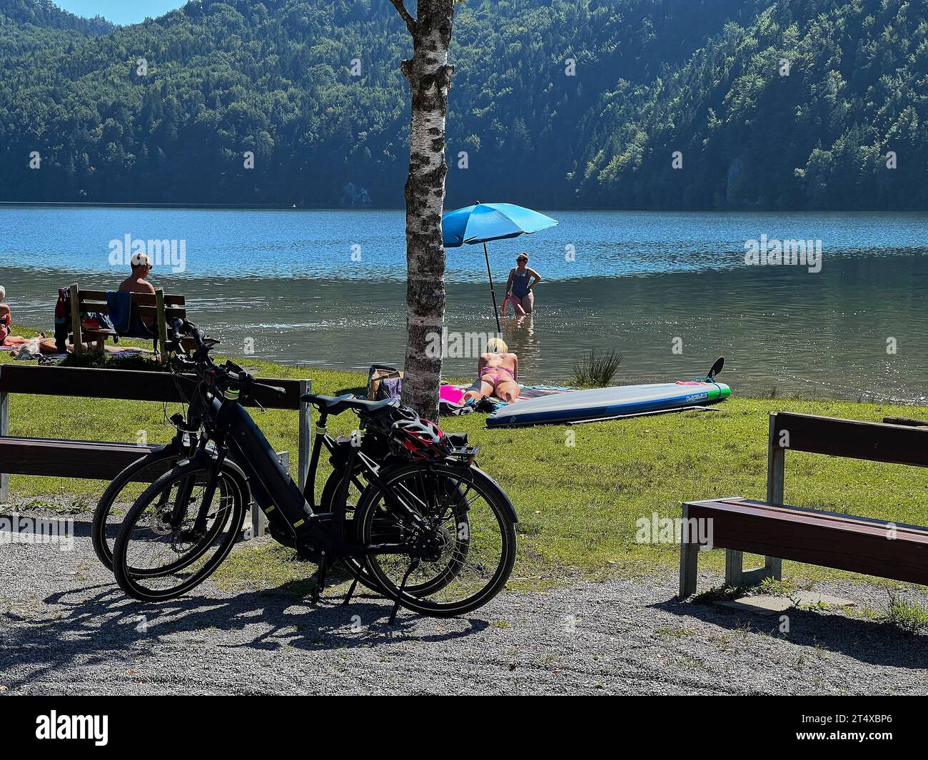 Hiker and cyclists at Weissensee lake recreation area in Füssen, Germany, Sept 5, 2023. Credit: Imago/Alamy Live News Stock Photo