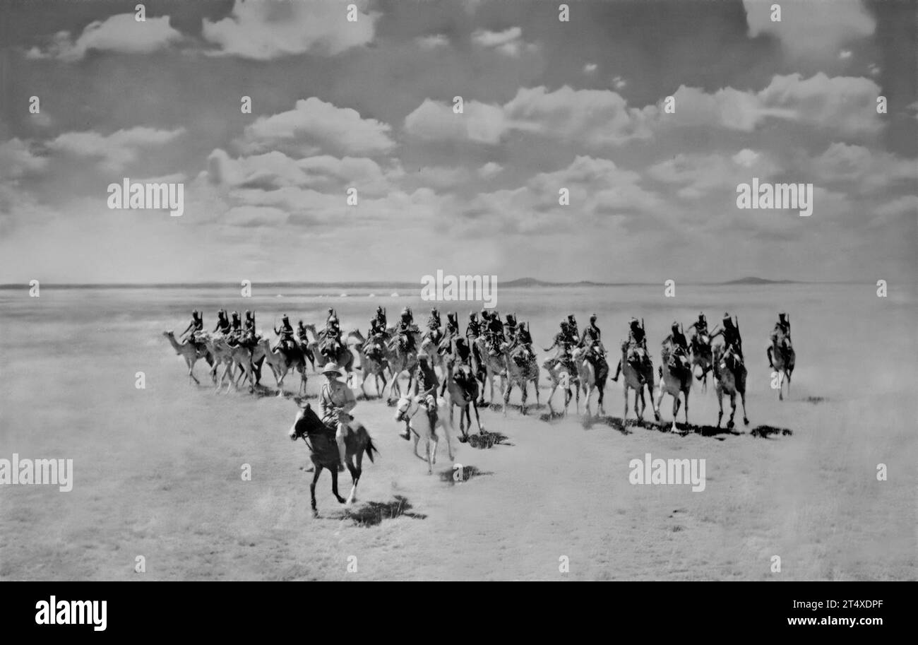 A patrol of the Somaliland Camel Corps in the desert following the invasion of British Somaliland by Italian forces on 6th August 1940. Impossible to defend Britain evacuated the country two weeks later. Stock Photo