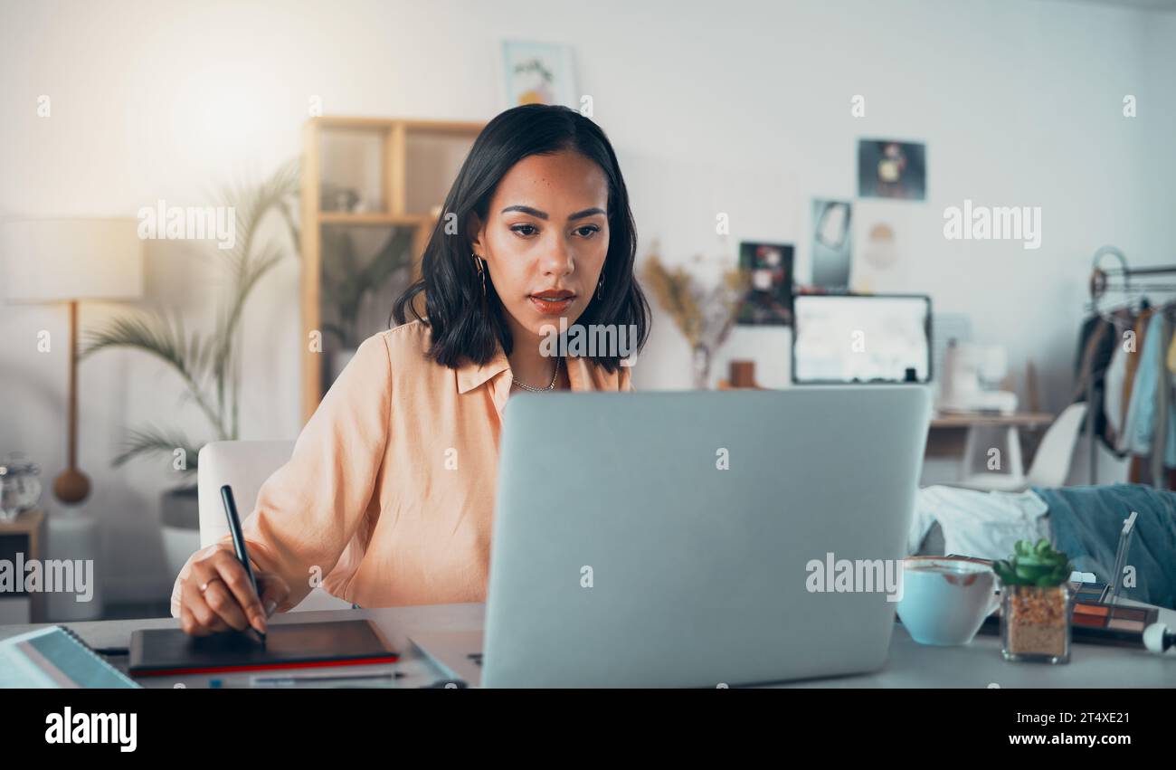 Laptop graphic designer, photo retoucher and freelance editor with interactive tablet, stylus or drawing equipment in studio. Serious, motivated and Stock Photo