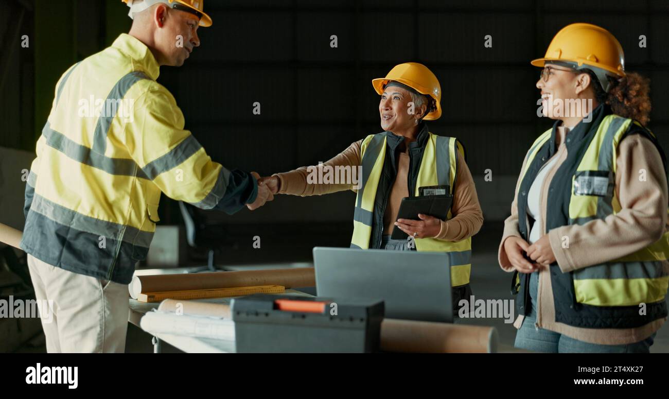 Engineering team, factory people and handshake for manufacturing