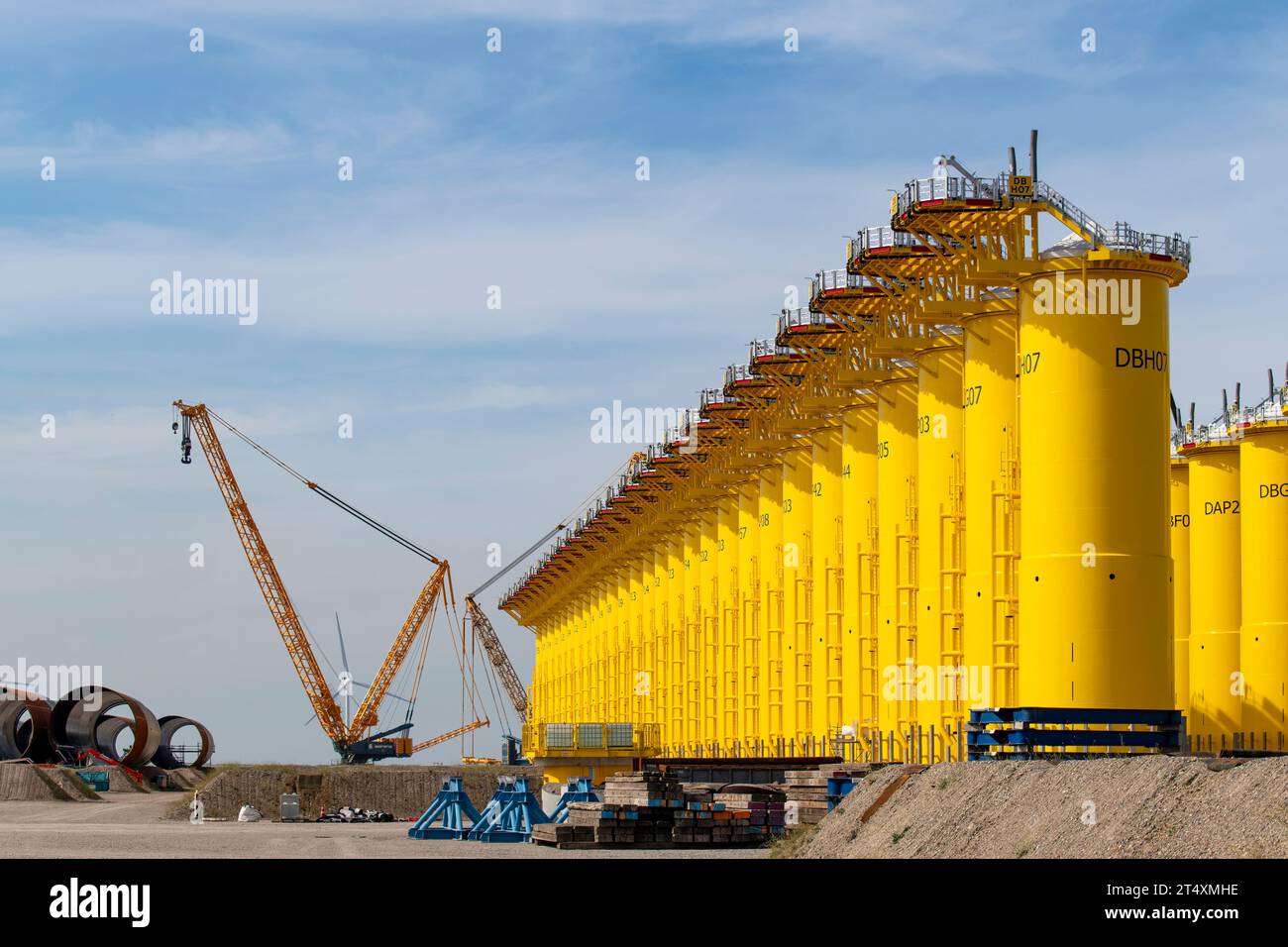 Rotterdam, the Netherlands-September 16, 2023; Construction site of steel tubular manufacturer SIF company with transition pieces for foundation for w Stock Photo