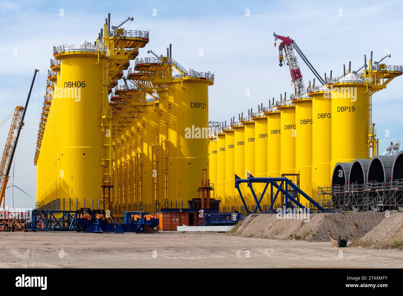 Rotterdam, the Netherlands-September 16, 2023; Construction site of steel tubular manufacturer SIF company with transition pieces for foundation for w Stock Photo
