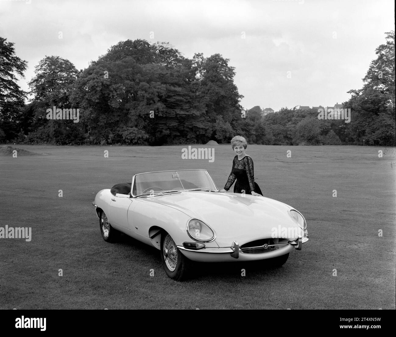 Black and white publicity photo of Jaguar Etype S1, Open TwoSeater, 3