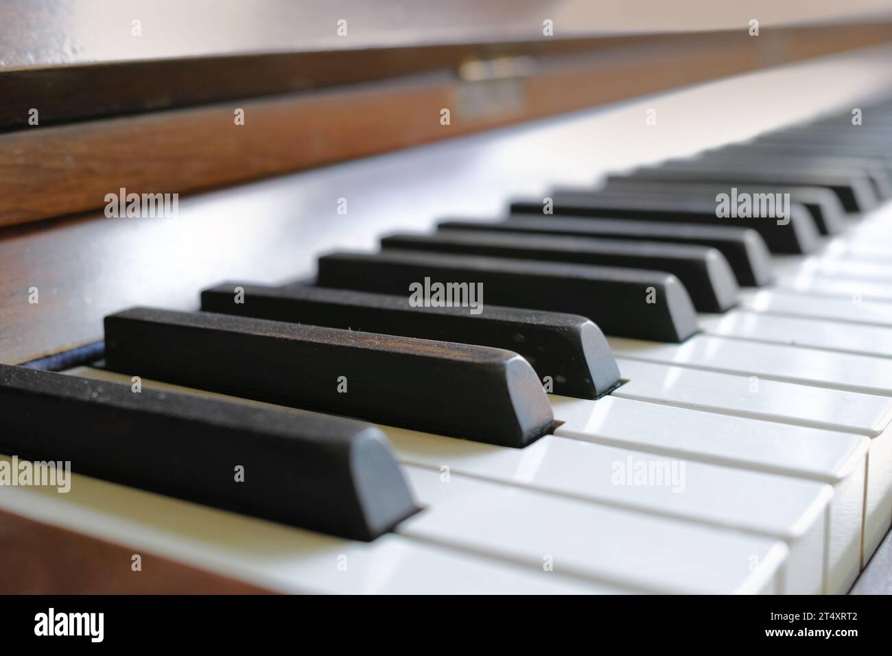 Closeup of a vintage piano and keyboard for music. Zoom in on an antique and classic musical instrument for a talented musician to play or compose Stock Photo