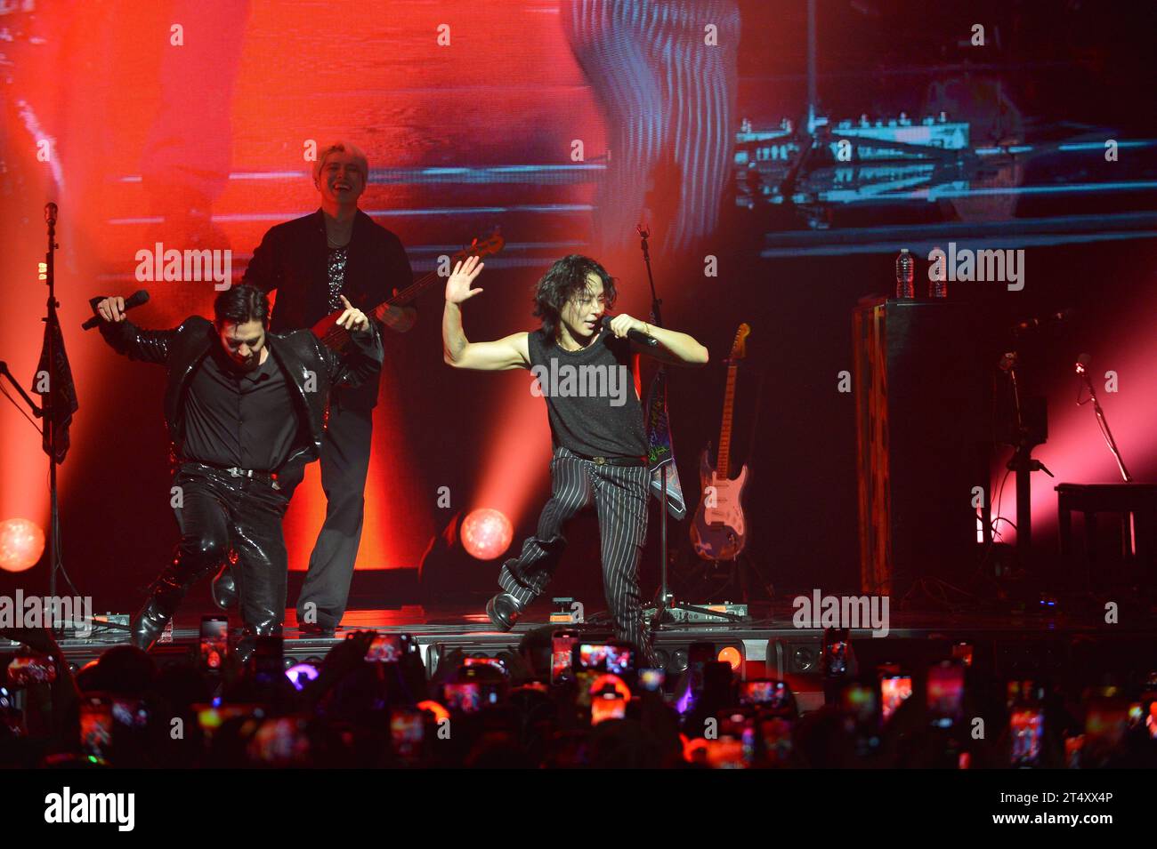Miami, Florida, USA. 31st Oct, 2023. Park Do-joon, Lee Jae-hyeong and Kim Woo-sung of Korean indie rock band THE ROSE perform live onstage during the ' Dawn to Dusk Tour' at James L. Knight Center on October 31, 2023 in Miami, Florida. Credit: Mpi10/Media Punch/Alamy Live News Stock Photo