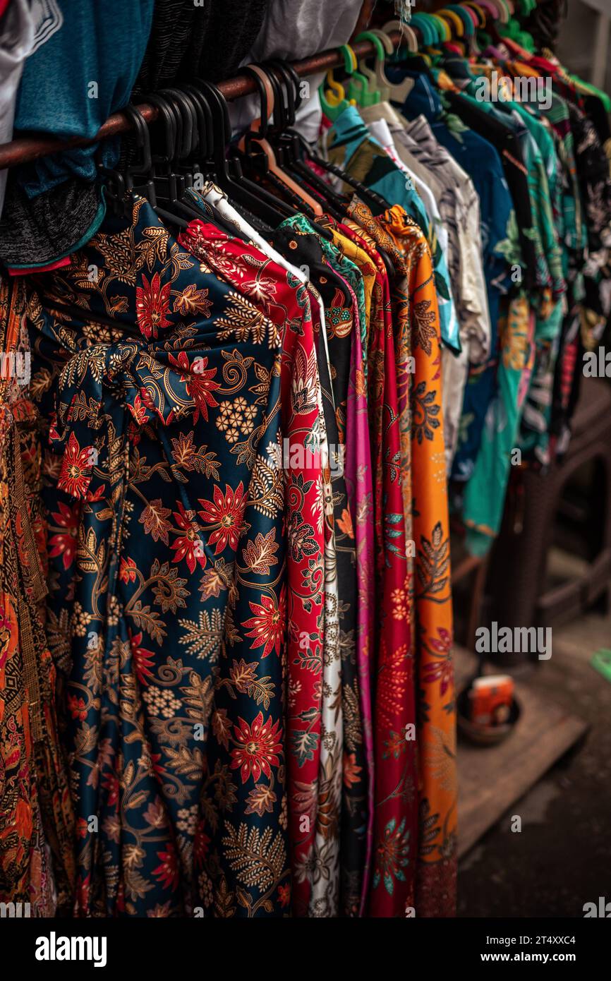 A vibrant display of clothing items in an outdoor market Stock Photo ...