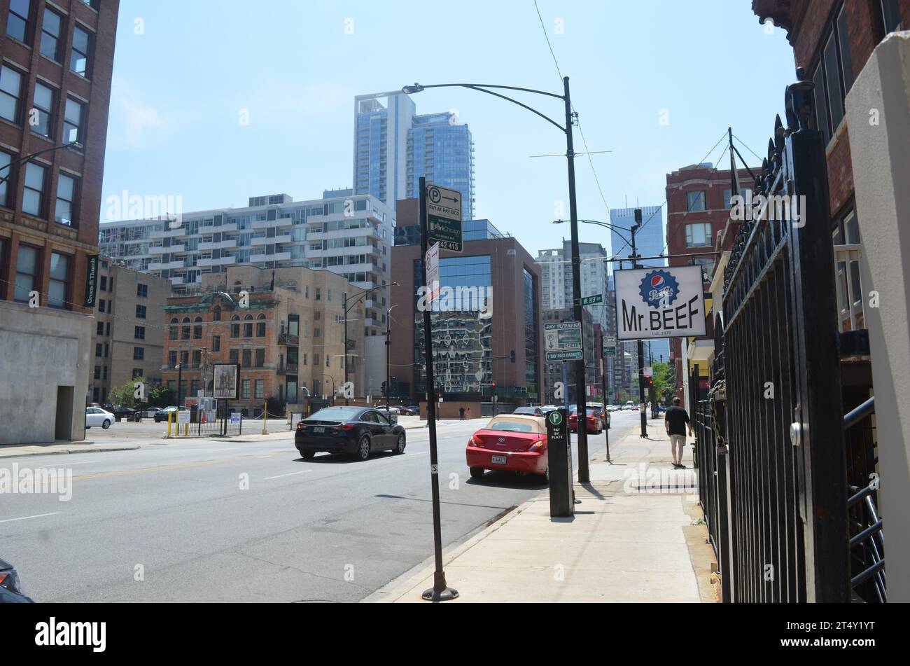 Chicago, Illinois, USA: June 3, 2024 - Sidewalk in front of Mr. Beef Restaurant Stock Photo