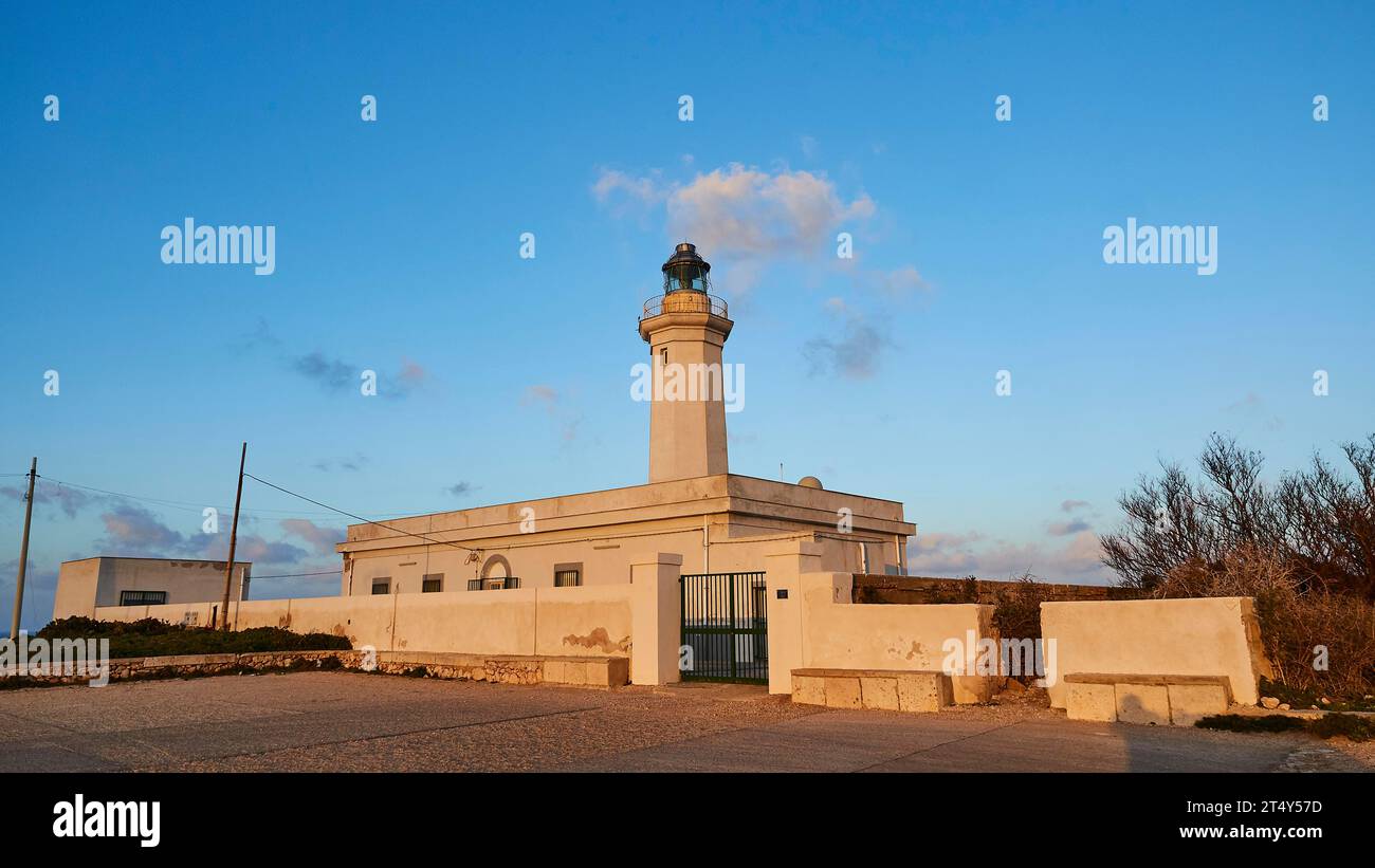 Evening light, lighthouse, super wide angle, tower and buildings, Faro di Levante, Lampedusa Island, Agrigento Province, Pelagic Islands, Sicily Stock Photo