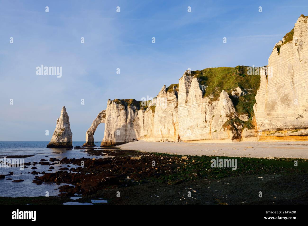 Cliff with the rock gate Falaise d'Aval and the rock needle Aiguille d ...
