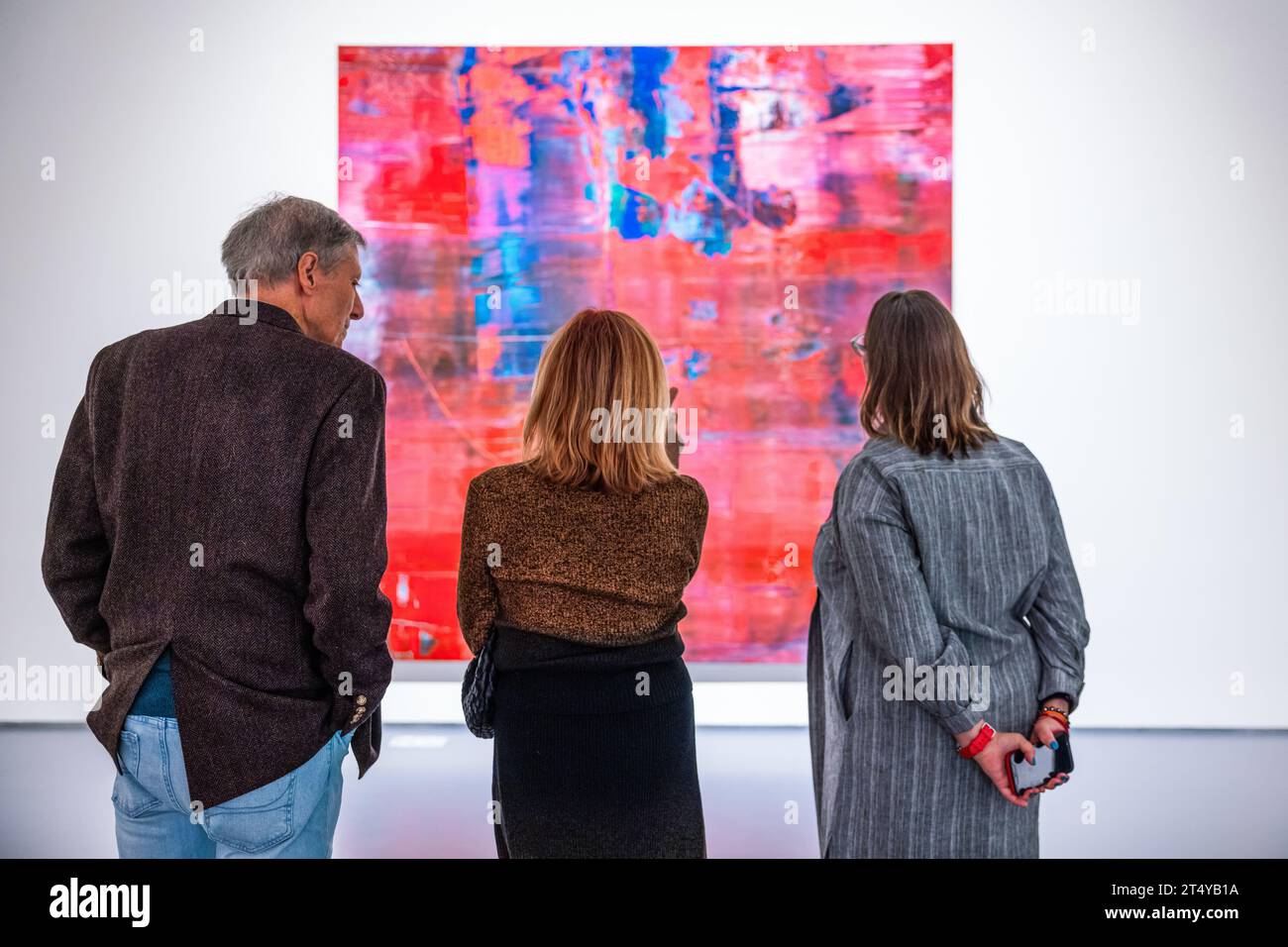 New York, USA. 01st Nov, 2023. Three attendees of Sotheby's Marquee Week Auction Preview chat and admire the piece 'Abstraktes Bild' by Gerhard Richter on November 1, 2023 in New York, NY. (Photo by Hailstorm Visuals/SIPA USA) Credit: Sipa USA/Alamy Live News Stock Photo