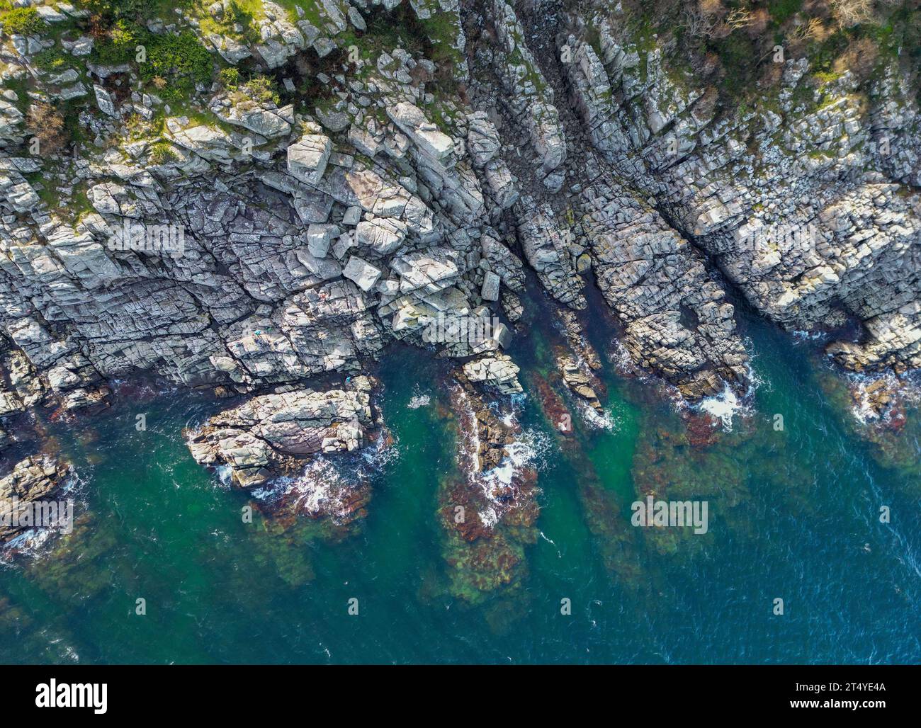 24 October 2023, Denmark, Saltune: The Randklöve Skar (Randklöven) rift valley on the north coast is one of the great natural sights on the Danish Baltic Sea island of Bornholm (aerial photo taken by drone). The island of Bornholm, together with the offshore archipelago Ertholmene, is Denmark's easternmost island. Thanks to its location, the island of Bornholm counts particularly many hours of sunshine. The island of Bornholm is - together with the offshore archipelago Ertholmene - Denmark's easternmost island. Thanks to its location, the island of Bornholm counts particularly many hours of su Stock Photo