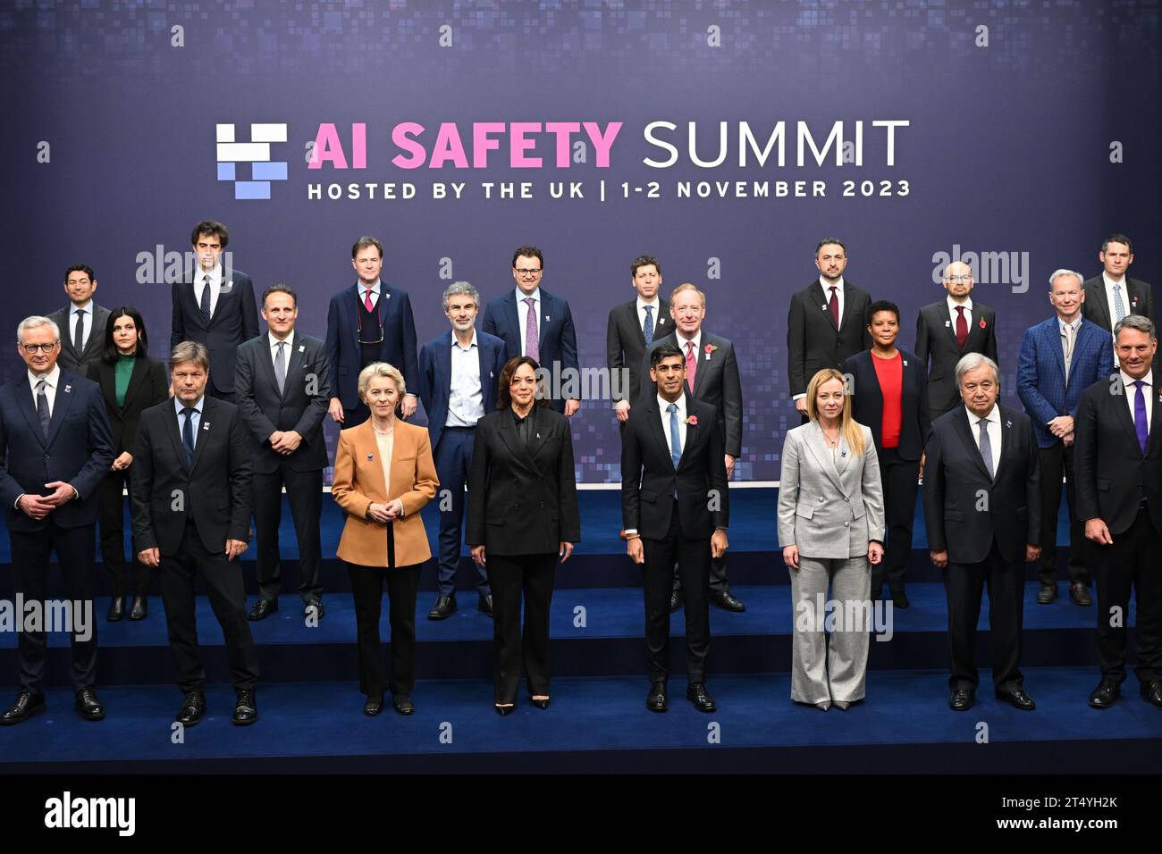 (First row, left to right) France's Minister for Economy, Finance, Industry and Digital Security Bruno Le Maire, German Economy and Climate Minister Robert Habeck, European Commission President Ursula von der Leyen, U.S. Vice President Kamala Harris, Prime Minister Rishi Sunak, Italy's Prime Minister Giorgia Meloni, UN Secretary General Antonio Guterres and Australia's Deputy Prime Minister and Minister of Defence Richard Marles pose for a group photograph on the second day of the AI safety summit, the first global summit on the safe use of artificial intelligence, at Bletchley Park in Milton  Stock Photo