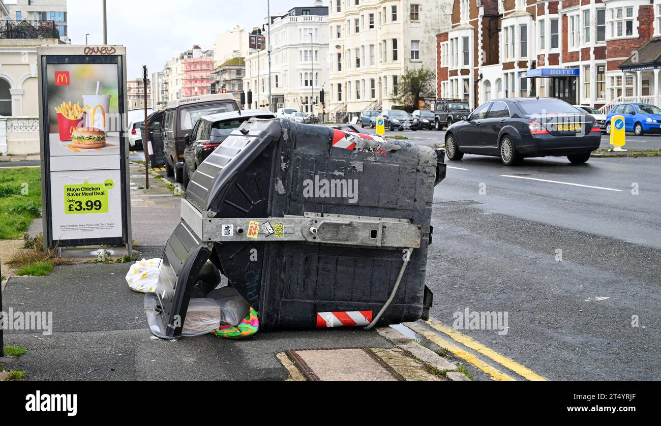 Brighton UK 2nd November 2023 A blown over waste bin on Hove seafront